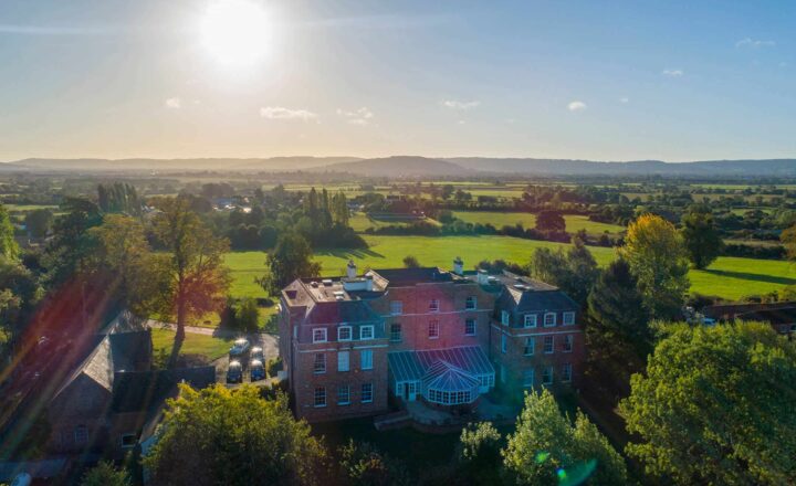 Aerial view of Abbeycare Gloucester at Hygrove House and surrounding countryside