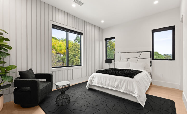 Private bedroom with large windows at an Altus Rehab Encino estate