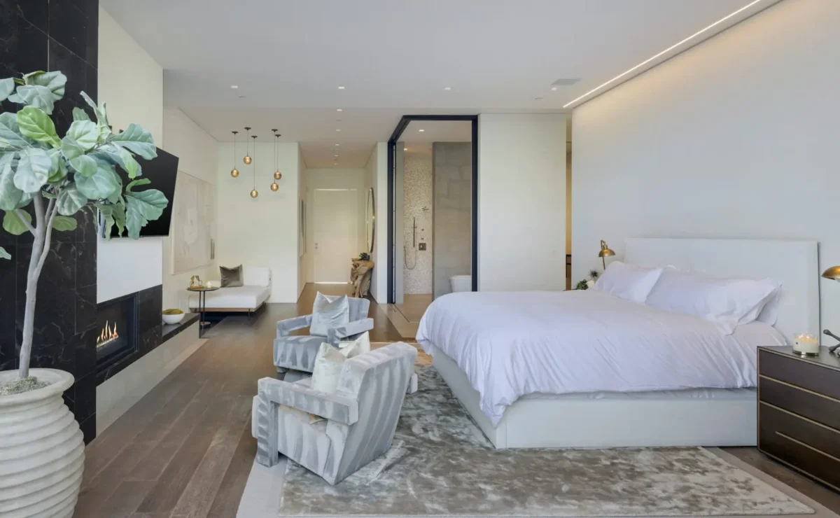 Holmby Hills bedroom at Carrara House Los Angeles, with sitting area, fireplace and en-suite bathroom