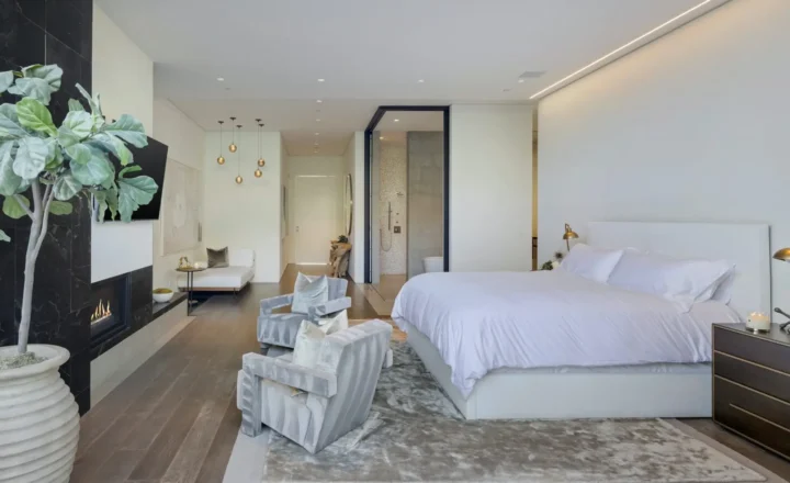 Holmby Hills bedroom at Carrara House Los Angeles, with sitting area, fireplace and en-suite bathroom