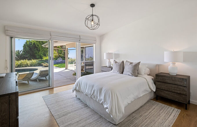 Private bedroom opening to the pool at Carrara Treatment Los Angeles II