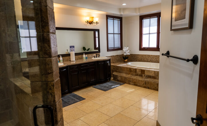 Residential bedroom with en-suite bathroom at Cope Recovery in Encino