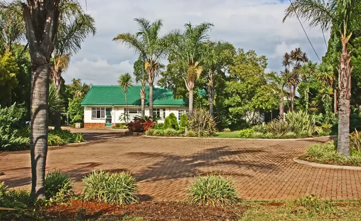 Entrance driveway and treatment building at Crossroads Recovery Centre in Pretoria