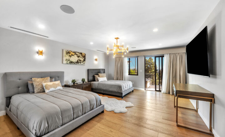 Spacious shared bedroom with two beds and a balcony at Glendale Luxury Rehab