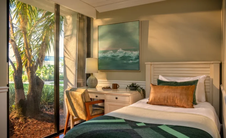 Residential bedroom with a garden-facing window at Hanley Center