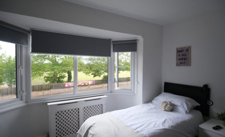 Single bedroom with a window at Liberty House Clinic in Luton