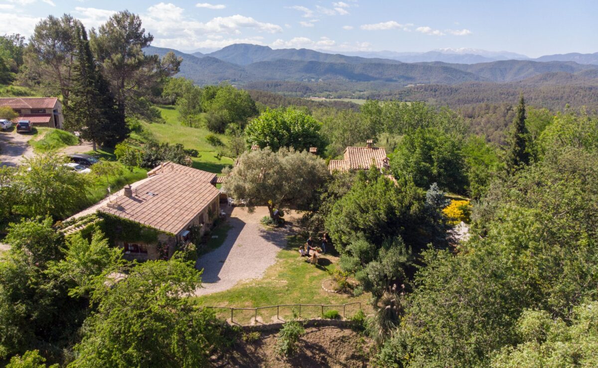 Aerial view of Mas Ferriol treatment buildings and wooded grounds in Girona