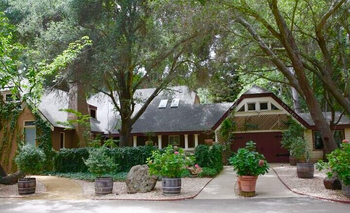 Residential cottage beneath mature trees at Milestones Ranch Malibu