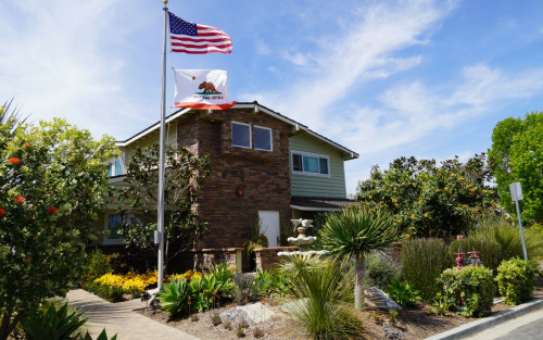 Exterior and landscaped entrance of New Directions for Women in Costa Mesa
