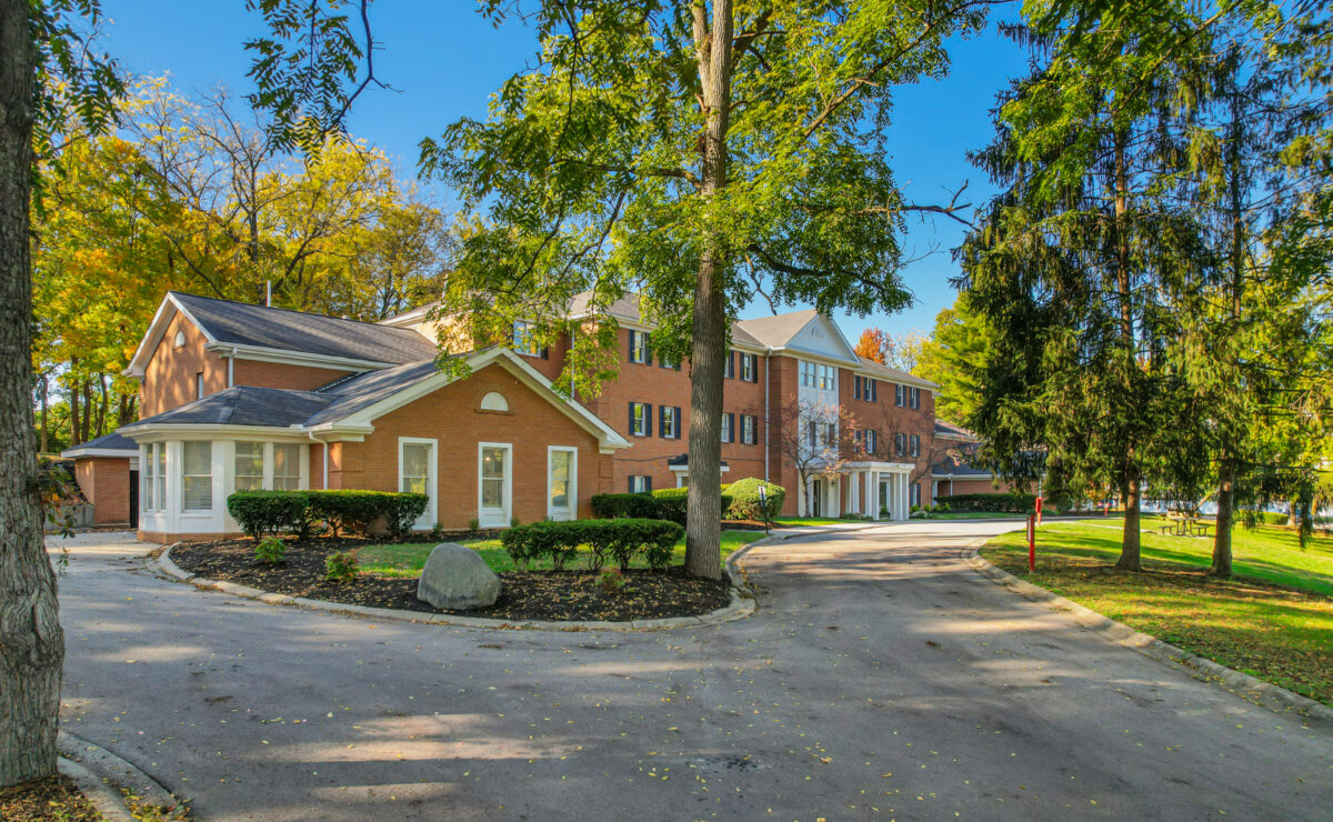 Three-story brick ReCreate Behavioral Health of Ohio residential campus in Gahanna