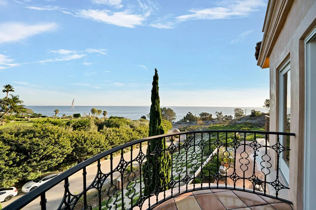 Balcony overlooking the grounds and Pacific Ocean at Seasons in Malibu