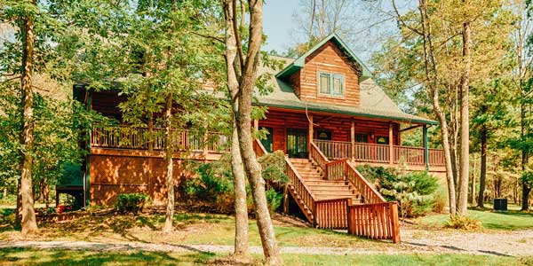 Log-and-stone residential lodge at St. Joseph Institute in Port Matilda, Pennsylvania