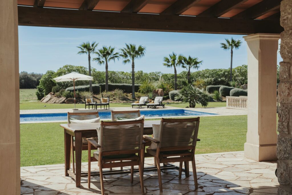 Outdoor dining area, garden and pool pictured by THE BALANCE Mallorca