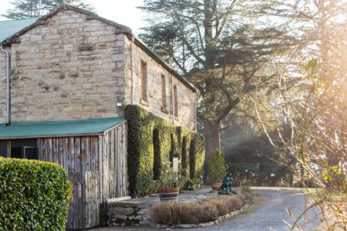 Stone exterior of The Cedars Midlands Estate near Mooi River