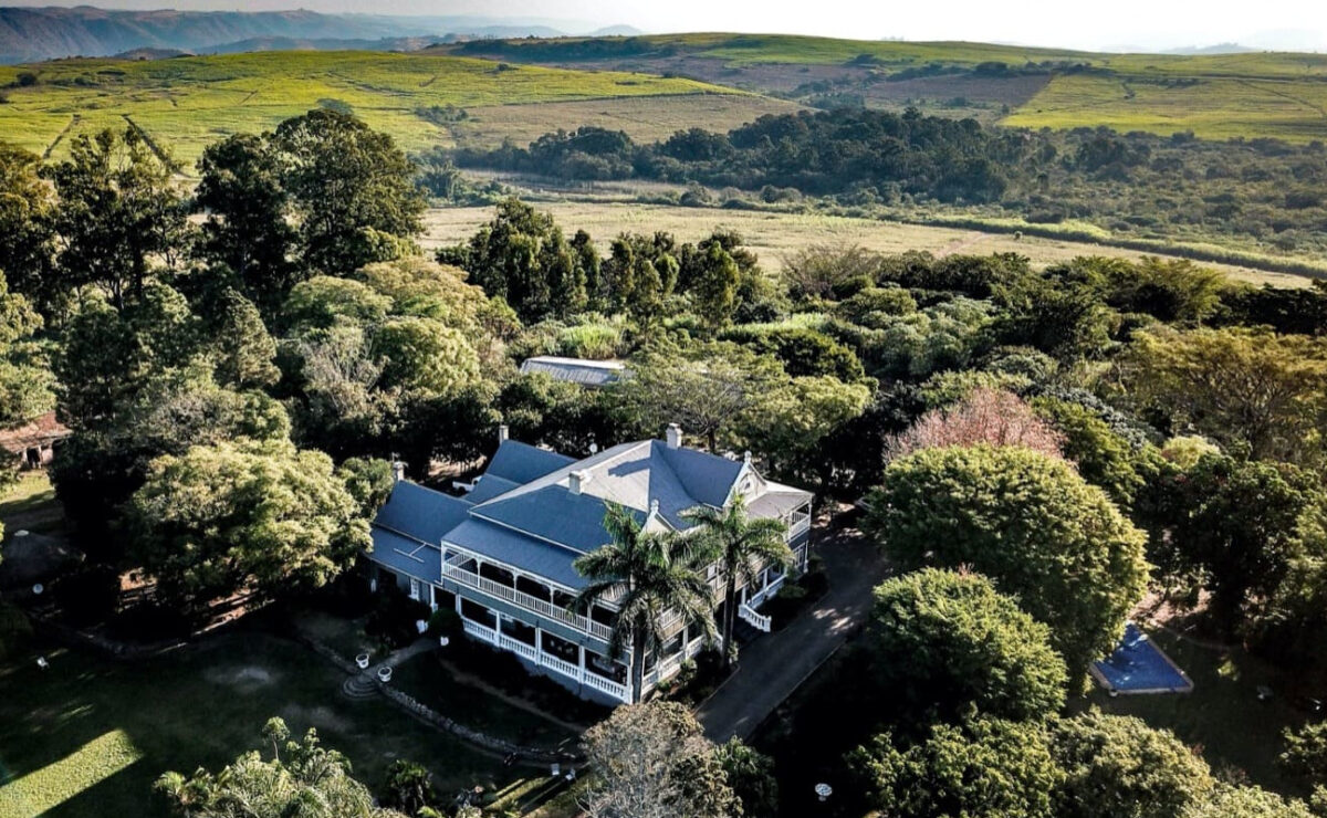Aerial view of The Cedars South Coast Estate farmhouse and grounds near Dududu