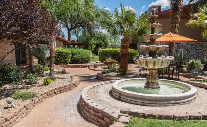 Fountain and landscaped courtyard at The Meadows in Wickenburg