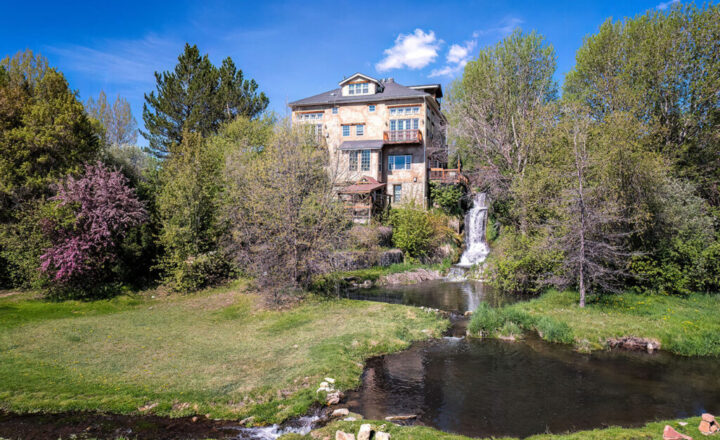 Acqua Recovery's Midway residential building beside its pond