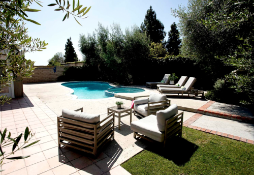 Pool and outdoor seating at a Casa Capri Recovery residence