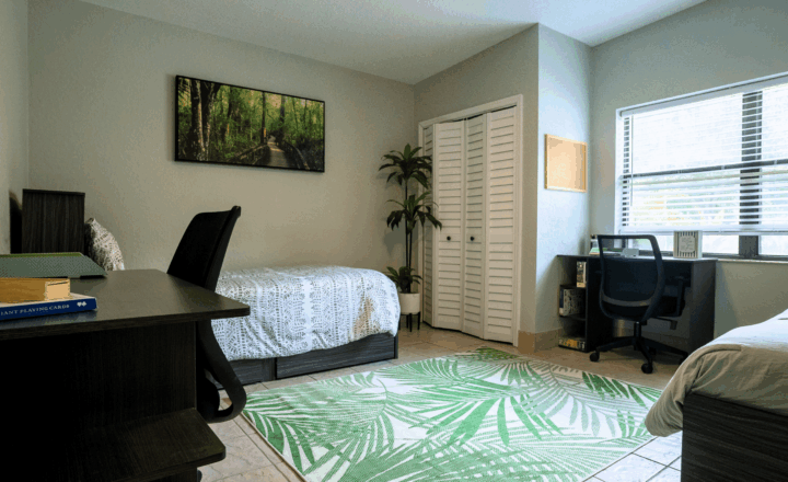 Shared residential bedroom with desks at Lifeskills Orlando