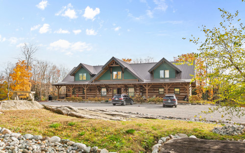 Log-style treatment residence at The Northern Lights in Muskoka Lakes
