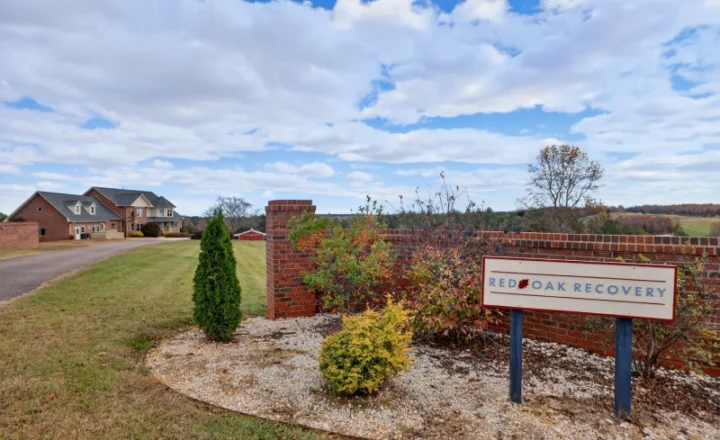 Entrance sign and buildings at Red Oak Recovery’s Ellenboro residential campus