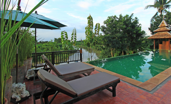 Poolside loungers at The Cabin Chiang Mai