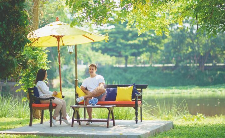 Shaded outdoor seating at The Dawn