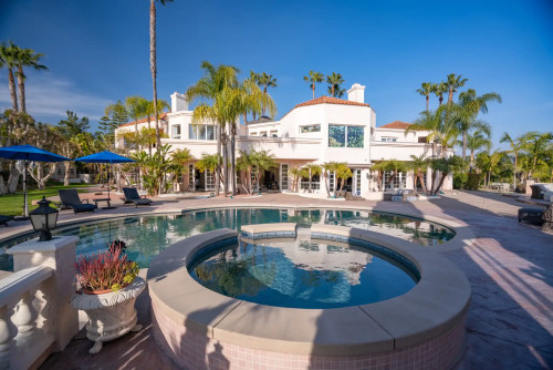 Pool and residential building at Villa Oasis San Diego