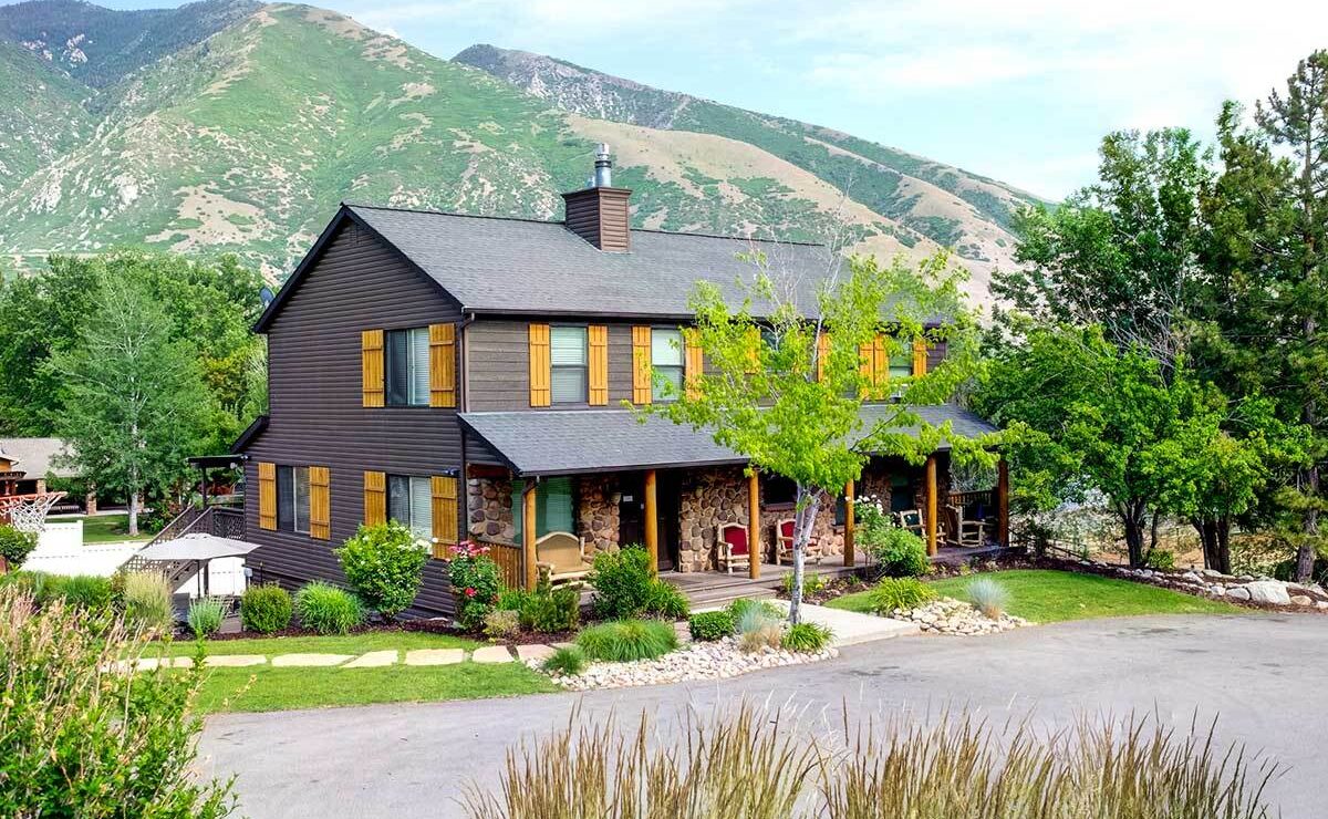 Deer Hollow Pioneer House residential campus beneath the Wasatch Mountains in Draper, Utah