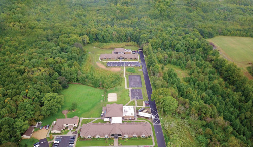 Aerial view of the wooded Pinelands Recovery Center campus in Medford New Jersey