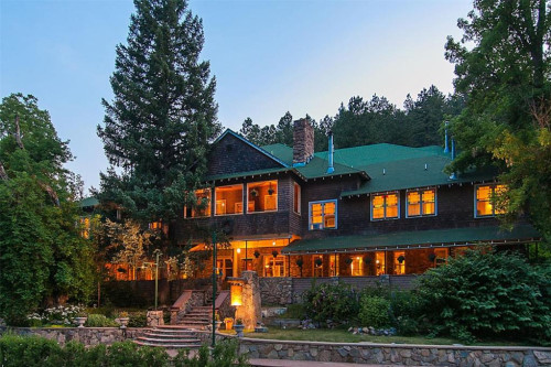 Stone lodge exterior at Sandstone Care Residential Boulder Canyon